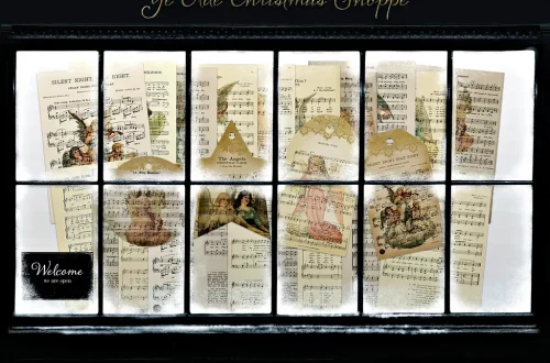 A display from "Ye Olde Christmas Shoppe" featuring Victorian Christmas music sheets adorned with Christmas-themed illustrations on each panel, viewed through a multi-pane window.
