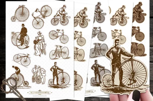 A set of sepia-toned vintage-style stickers featuring brown and white illustrations of old-fashioned bicycles and people riding them. One hand holds a cut-out sticker of a man with a penny-farthing bicycle, while scissors sit on a dark surface in the background.