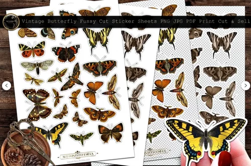 Various sheets of fussy cut stickers featuring vintage butterflies are displayed on a wooden surface. Each sheet showcases butterflies of different sizes and colors, arranged neatly. A person's hand holding a large yellow and black butterfly cutout is visible at the bottom right.