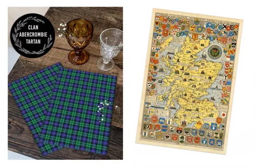 A tabletop with two tartan napkins and three different colored glasses on the left side. The napkins have a blue, green, and black checkered pattern. On the right side, there is a detailed illustrated map of Scotland with various heraldic symbols and crests.