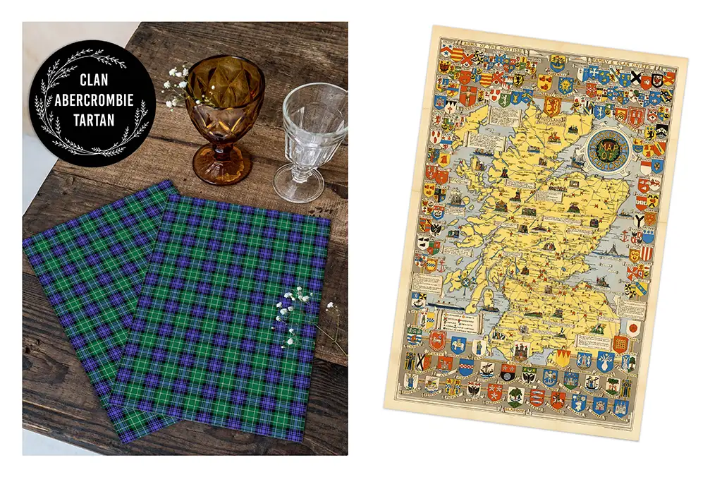 A tabletop with two tartan napkins and three different colored glasses on the left side. The napkins have a blue, green, and black checkered pattern. On the right side, there is a detailed illustrated map of Scotland with various heraldic symbols and crests.