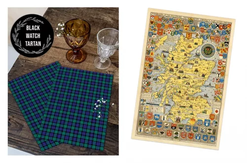 On the left, two glasses, one amber and one clear, sit beside two Black Watch tartan napkins and small white flowers. On the right, a detailed map of Scotland with various crests and heraldic symbols is displayed.